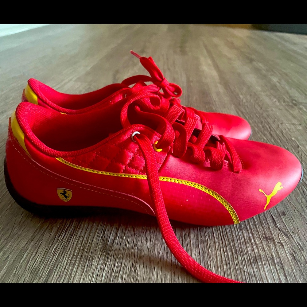red boys puma 5.5